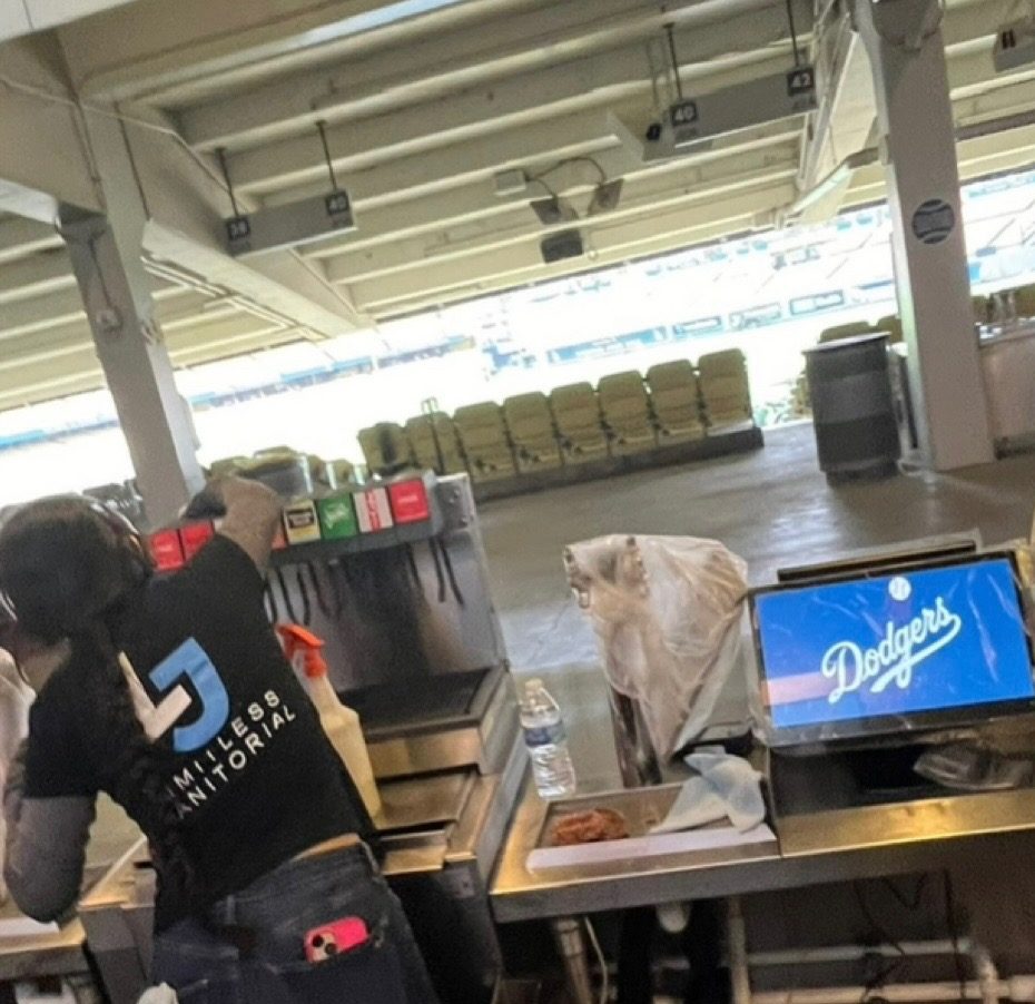 Limitless Janitorial Service LLC crew member servicing a Dodger Stadium concession stand
